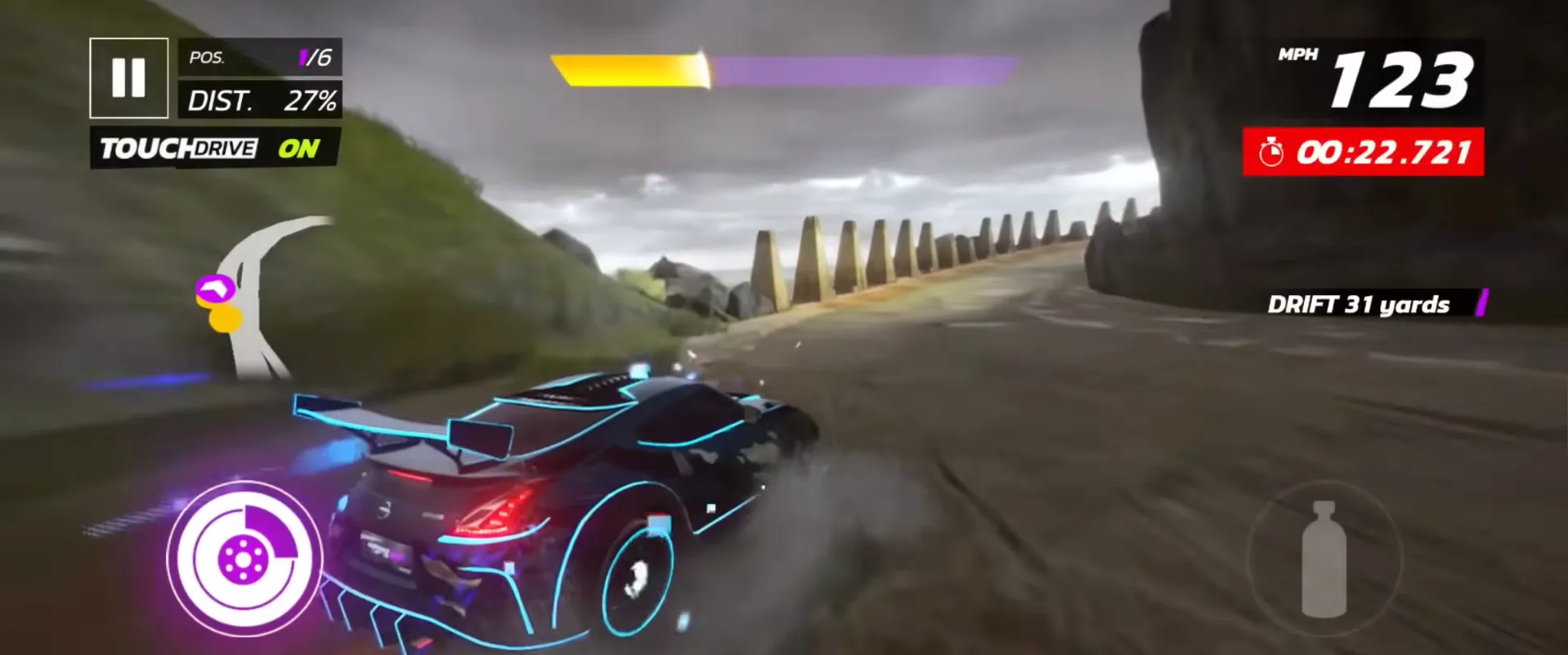 A car drifting through a mountain pass in Asphalt Legends Unite with TouchDrive on, the nitro ring charged and the speedometer reading 123 mph