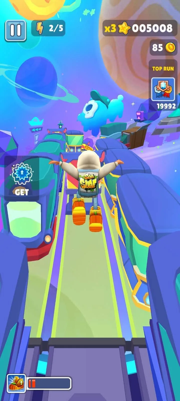 A Subway Surfers run down a neon World Tour track, the score counter and 3x multiplier along the top of the screen