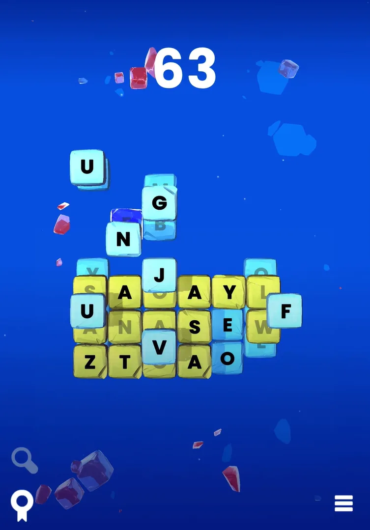 Downwordly's 3D letter blocks tumbling into a stack on a blue background, the score reading 63